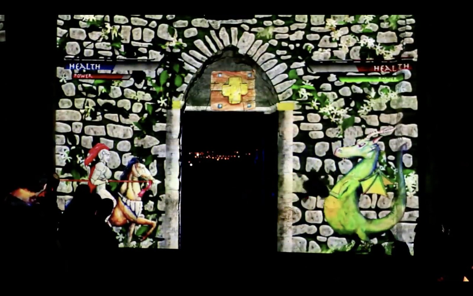 Castle Defender projection-mapped game on a historic wall