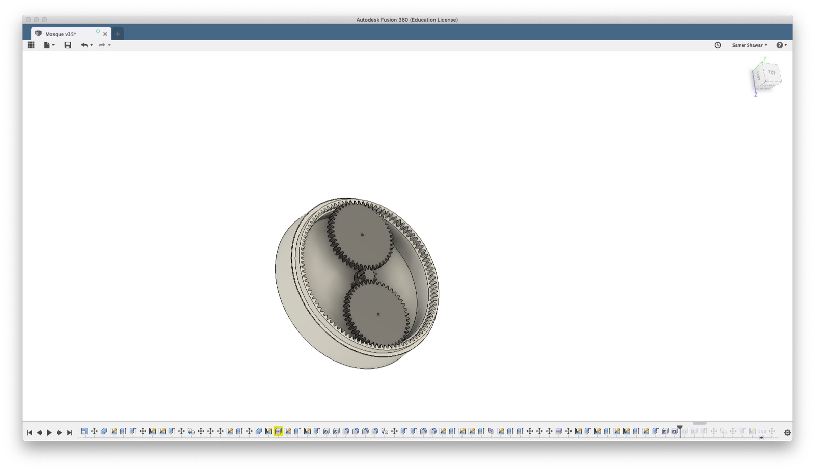 Fusion 360 view of the rotating base mechanism: twin meshing gears inside a ring-geared circular housing